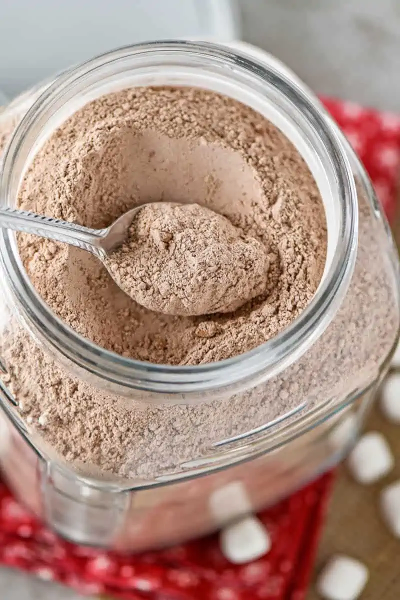 homemade hot chocolate mix in a jar with a spoon