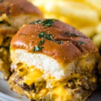Philly cheesesteak sliders on gray plate