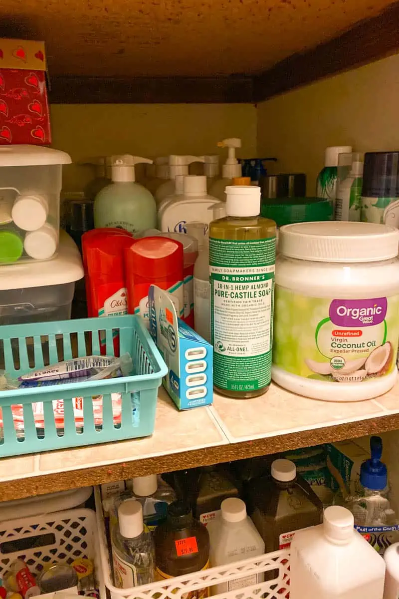 hygiene, first aid, and household supplies in a working pantry cabinet