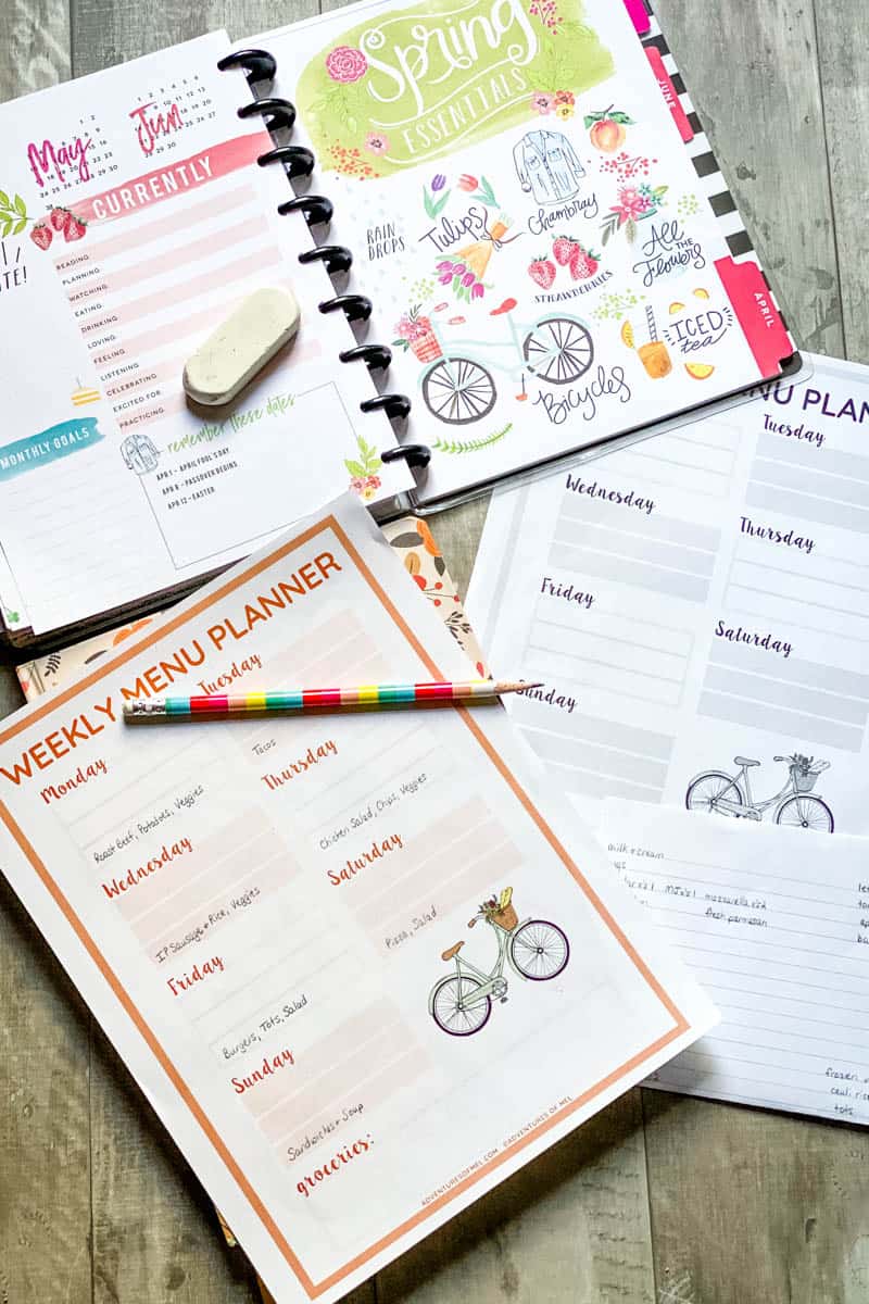 weekly menu planner printable with pencil, eraser, grocery list on notebook paper, and Happy Planner
