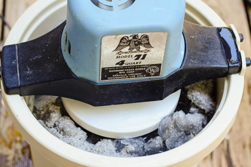 motorized ice cream freezer filled with ice and rock salt for making homemade banana ice cream