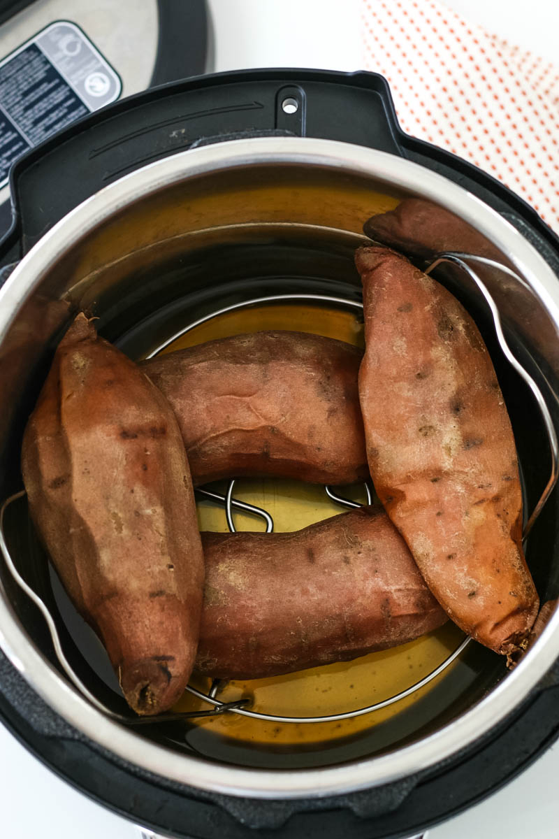 pressure cooked whole sweet potatoes with water in Instant Pot