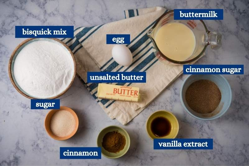 ingredients for Bisquick cinnamon scones on white marble countertop