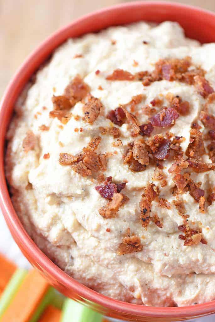 bacon cheddar bbq ranch dip in red bowl