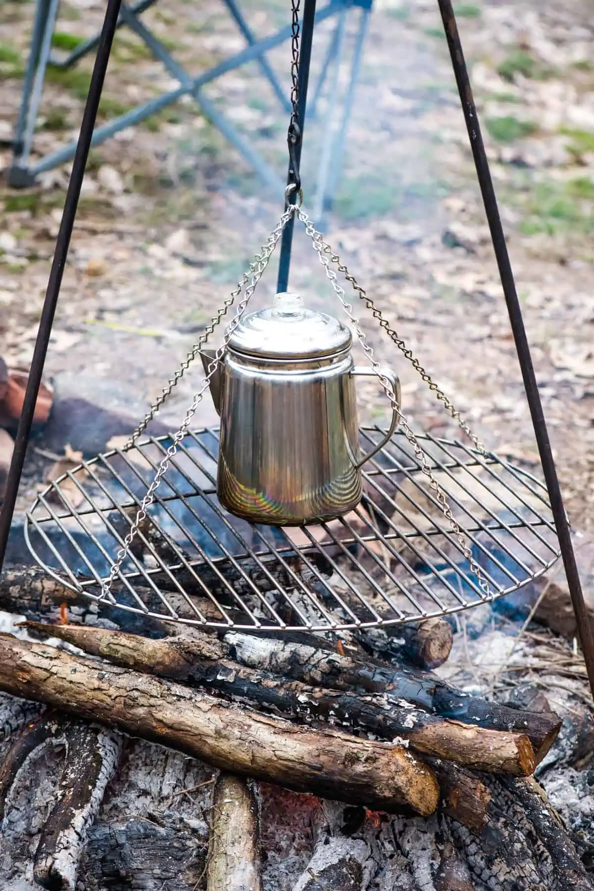 how to make coffee over a fire in a percolator pot on a grate  above the campfire