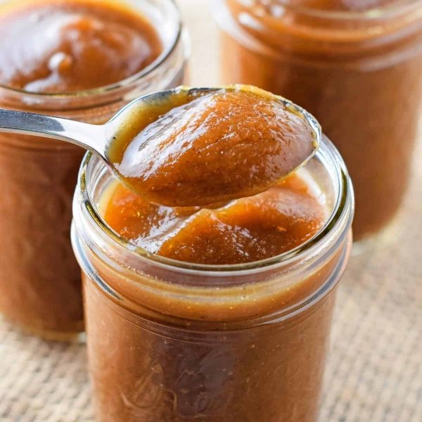 spoonful of Instant Pot apple butter over mason jar