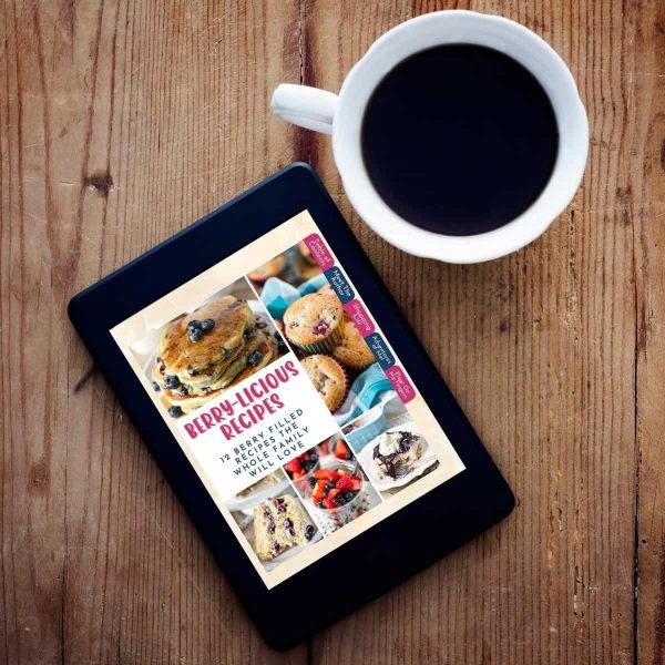 Berry Recipes cookbook on tablet with cup of coffee