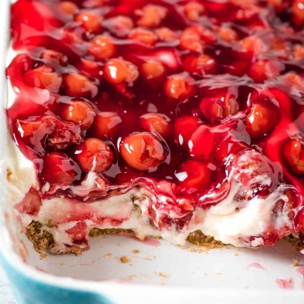 sliced cherry delight in blue and white baking dish