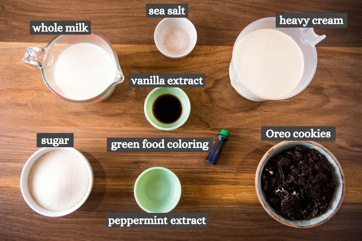 mint Oreo ice cream ingredients on wood countertop