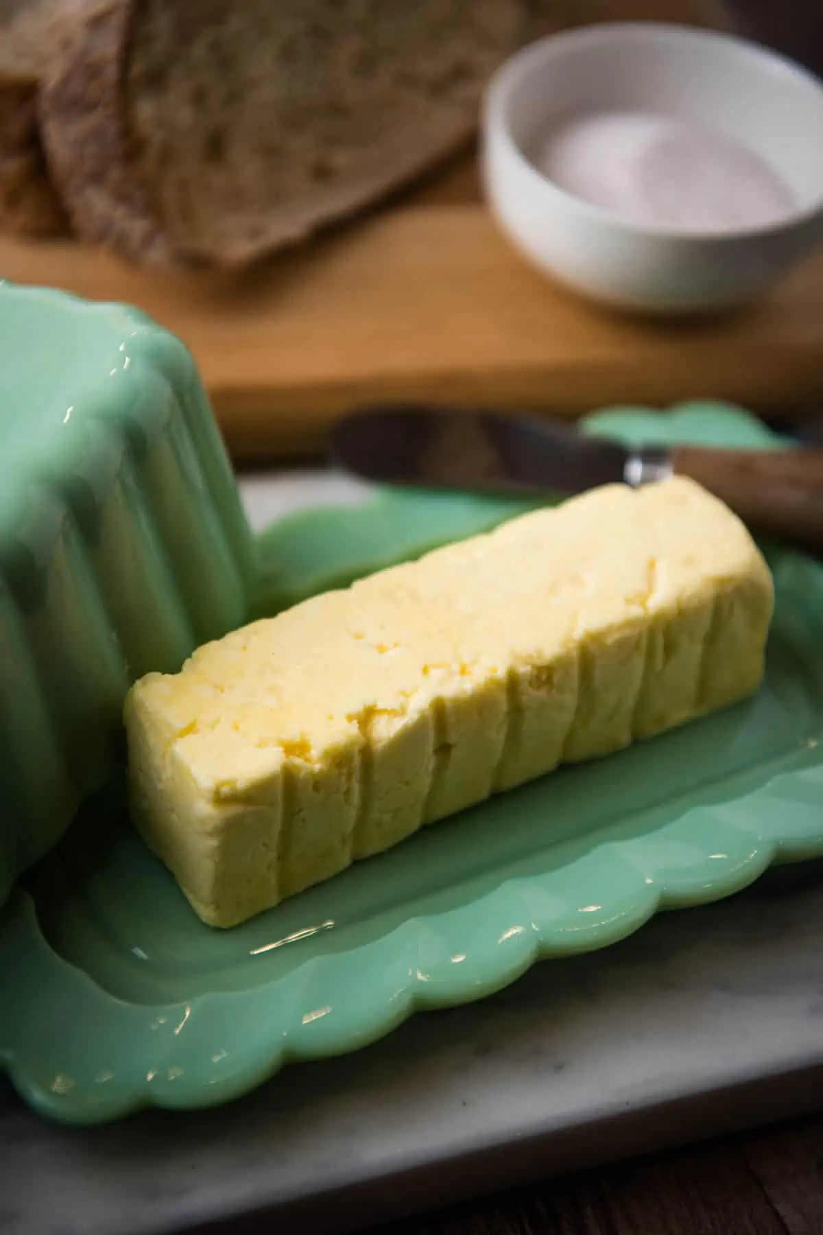 homemade raw milk butter stick on jadeite green butter dish
