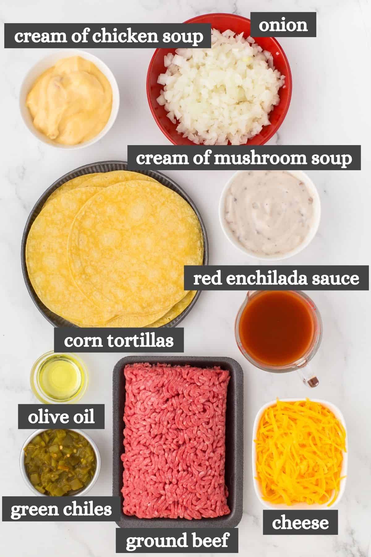 ground beef enchilada casserole ingredients lined out on a white countertop