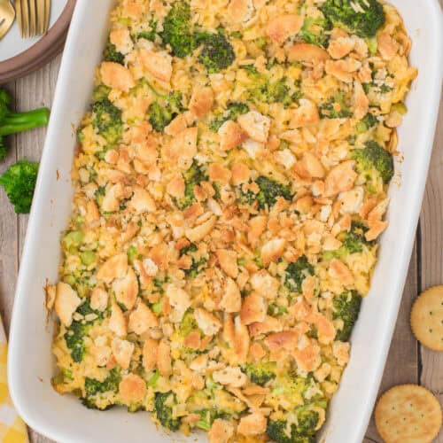 overhead shot showing broccoli cheese rice casserole in a large white 9x13 baking dish