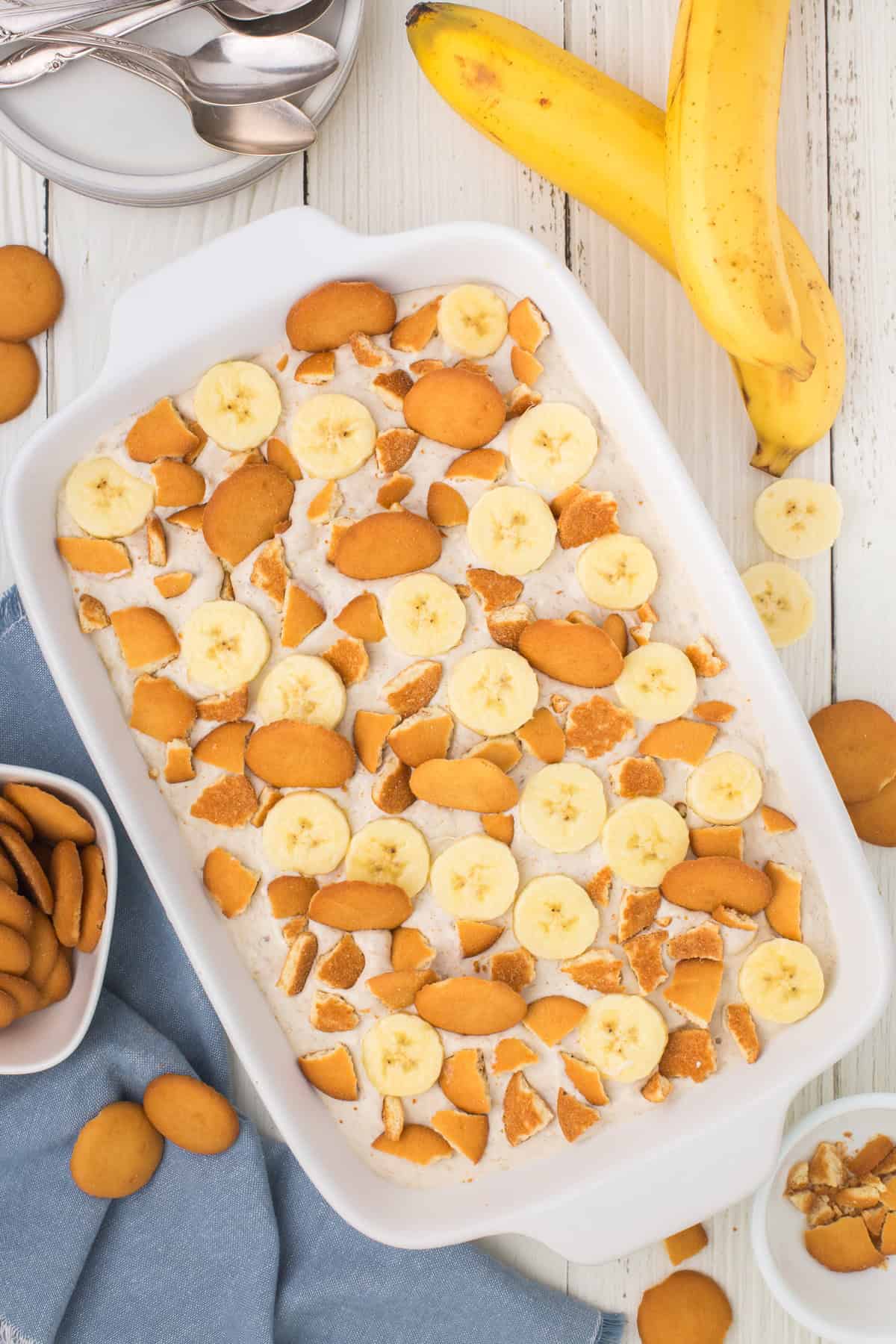 overhead shot showing no bake banana pudding in a white 9x13 casserole dish