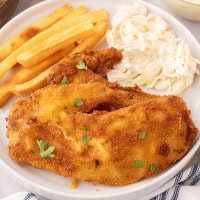 fried crappie on plate with fries and cole slaw